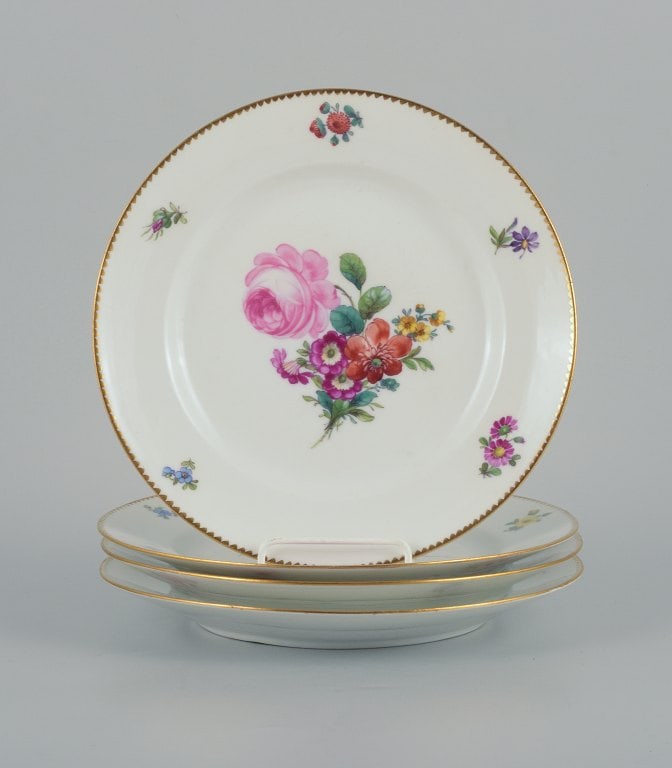 B&G, Bing & Grondahl Saxon flower. Four dinner plates decorated with flowers and gold rim. (1 of 6)
