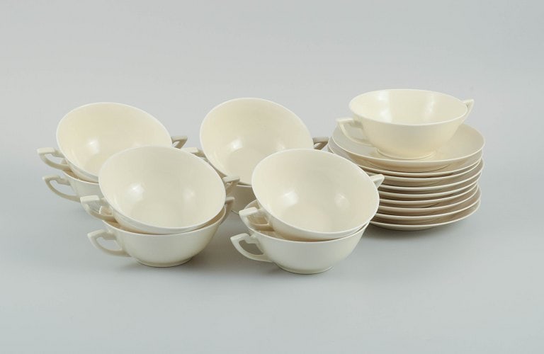 Nine pairs of Royal Copenhagen cream-coloured bouillon cups with matching saucers. - 2