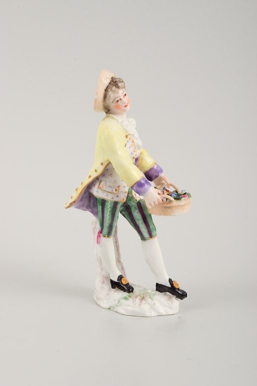 Presumably German porcelain figure, man with flower basket, 19th century. - 2