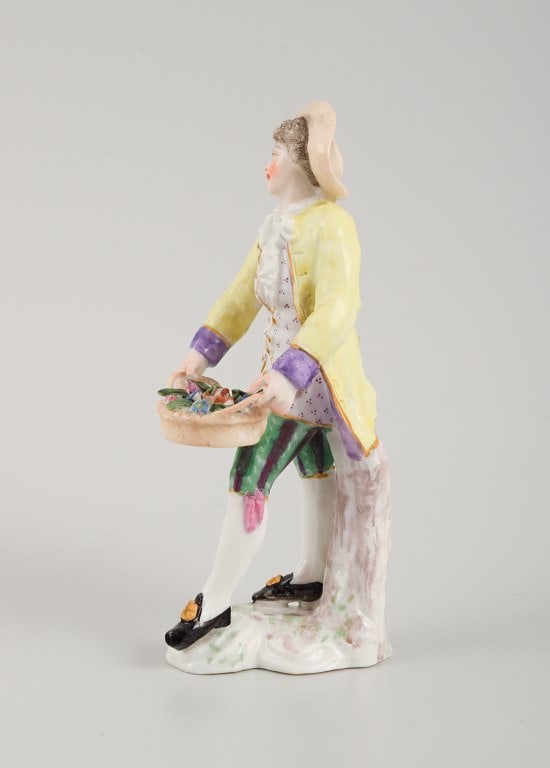 Presumably German porcelain figure, man with flower basket, 19th century. - 3