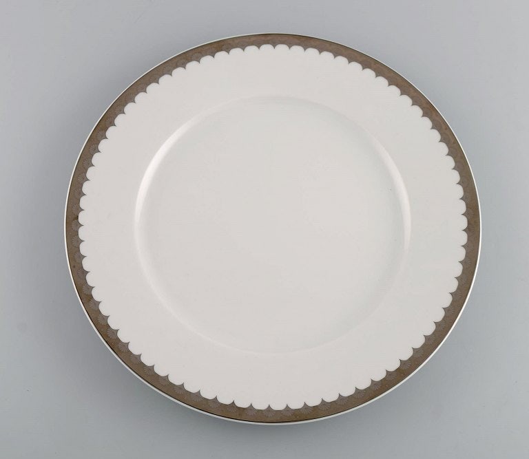Sigvard Bernadotte for Christineholm. Twelve large dinner plates in porcelain with silver border. - 2