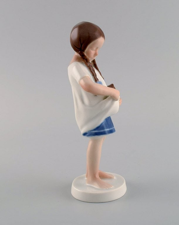 Bing & Grøndahl porcelain figure. Girl with cat. 1970s. Model number 1779. - 2