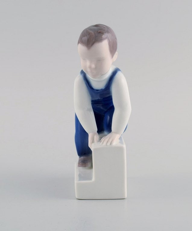 Claire Weiss for Bing & Grøndahl. Porcelain figure. Boy. 1970s. Model number 2399. - 2