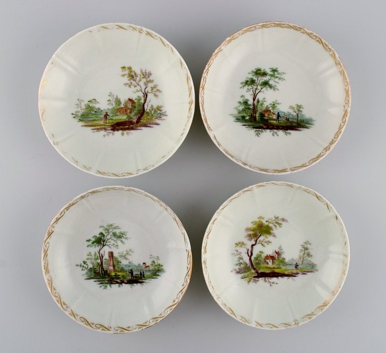 Four antique Royal Copenhagen porcelain bowls with hand-painted landscapes and gold decoration. (1 of 7)