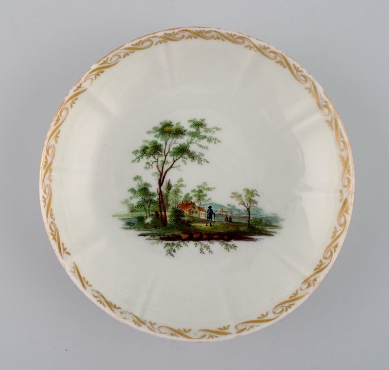 Four antique Royal Copenhagen porcelain bowls with hand-painted landscapes and gold decoration. - 4