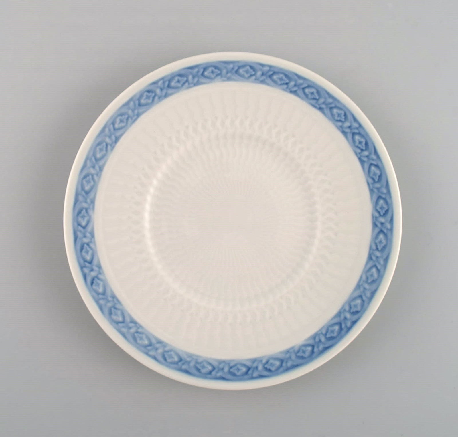 14 Royal Copenhagen Blue Fan side plates. 1960s. Model number 1212/1522. Designed by Arnold Krog in - 2