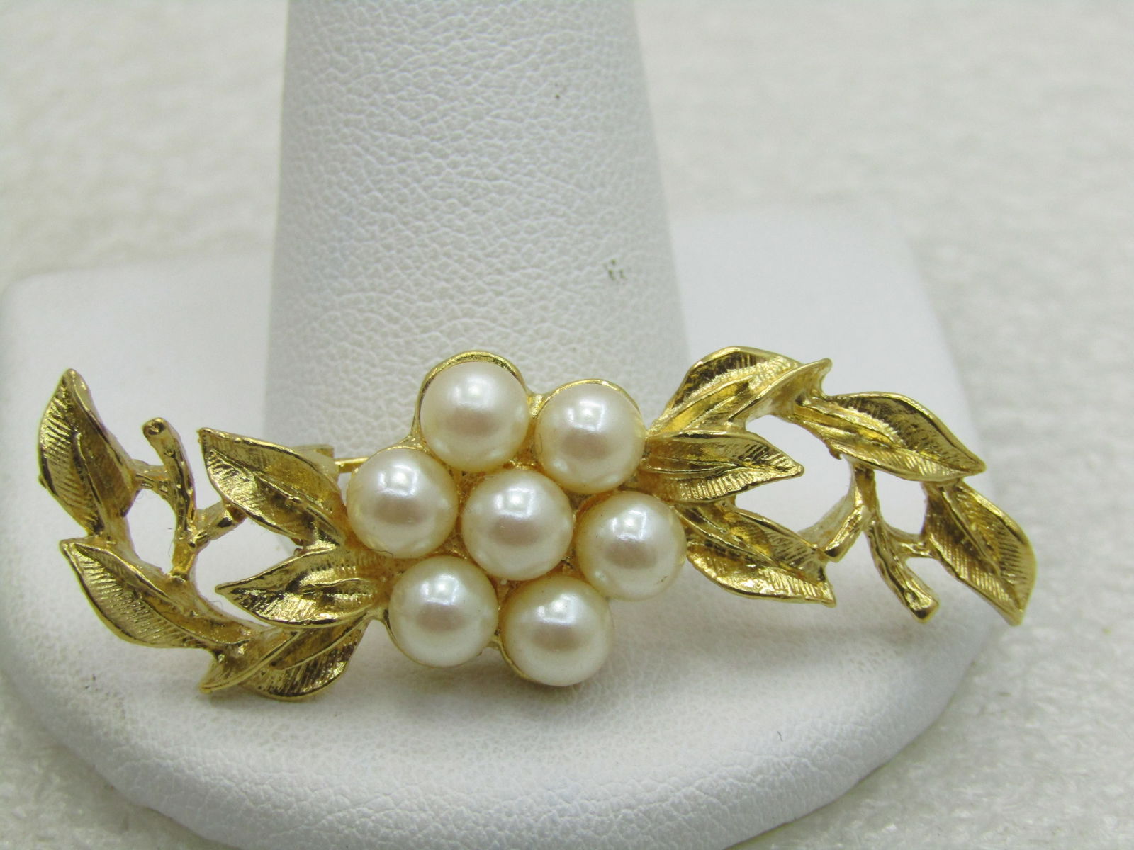Vintage Angel Brooch Signed Jane with Faux Pearl Red Heart: Vintage Faux Pearl Swag Brooch, Signed Richelieu, 1-7/8" wide and 5/8" tall. Faux pearl blossom in the center with leaves trailing off to either side. Very good condition, like new. 1970's-1980's. (IN