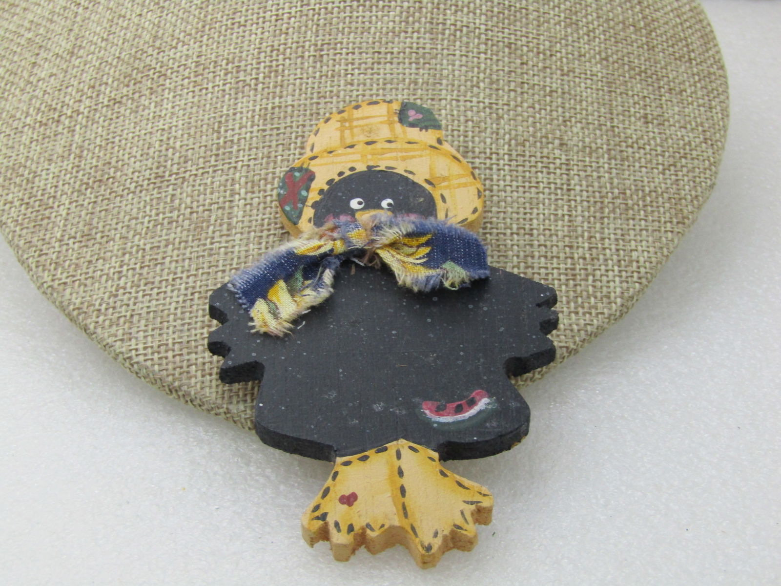 Vintage Autumn Painted Scarecrow Brooch,Wooden, 4" by 2.5": Vintage Autumn Painted Scarecrow Brooch,Wooden, 4" by 2.5". Black painated scacrecrow with patches, a straw hat and other painted details. 1980's. Not signed. Great for the upcoming fall season. (Very