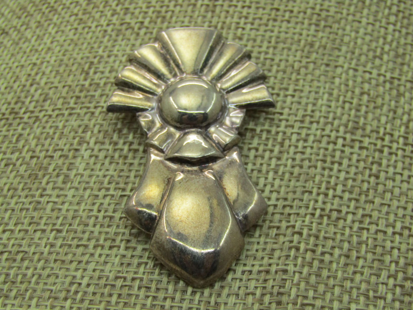 Vintage Sterling Silver Ray & Ribbon Brooch, Sigined Star with S, 1940's: Vintage Sterling Silver Ray & Ribbon Brooch, Sigined Star with S, 1940's, 2" tall and 1.25 wide. This is signed with a five point star and an S in the center. Tests as sterling. Also signed with Star