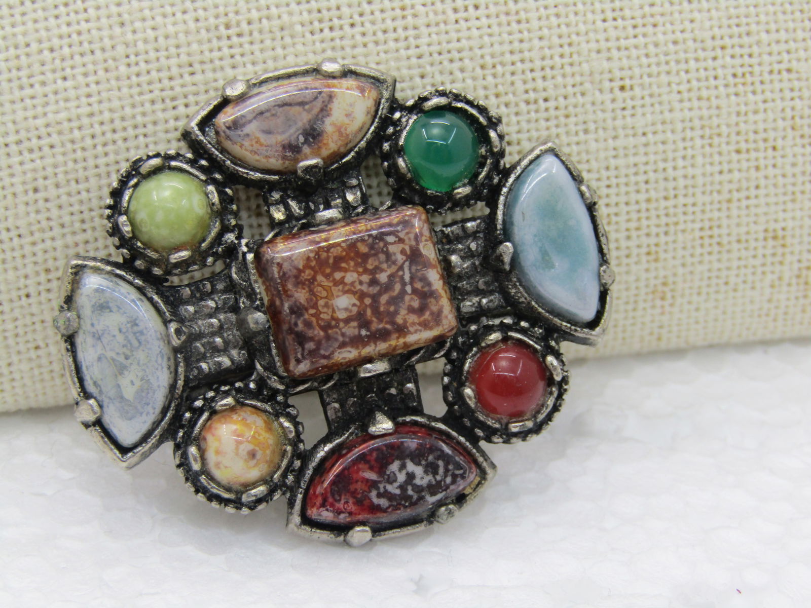 Vintage Faux Agate Medieval Brooch, 2" by 1.75": Vintage Faux Agate Medieval Brooch, 2" by 1.75" with faux jade, carnelian and agate stones. Very good condition. Not signed by the maker. 1970's-1980's. (INV.W31420.5 SS1433 LEB LD 8/13/20 Reserve:
