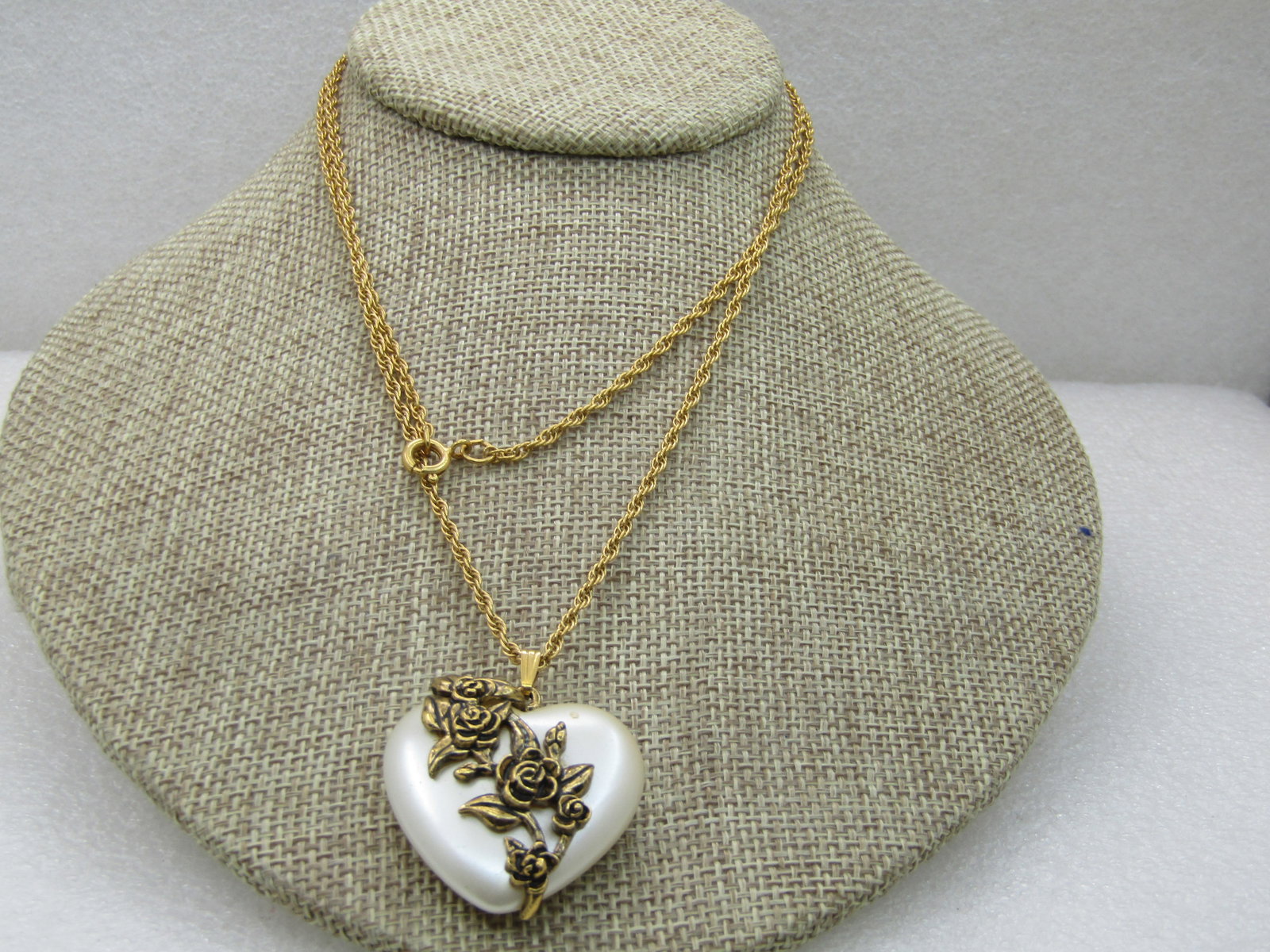 Vintage Faux Pearl Rose Heart Necklace, 30" Rope Chain, 1.5mm, 1970's: Vintage Faux Pearl Rose Heart Necklace, 30" Rope Chain, 1.5mm, 1970's, This is a puffy white heart that is appx. 1.5" long with bail and 1.25" wide. It has a trail of roses over the front of the