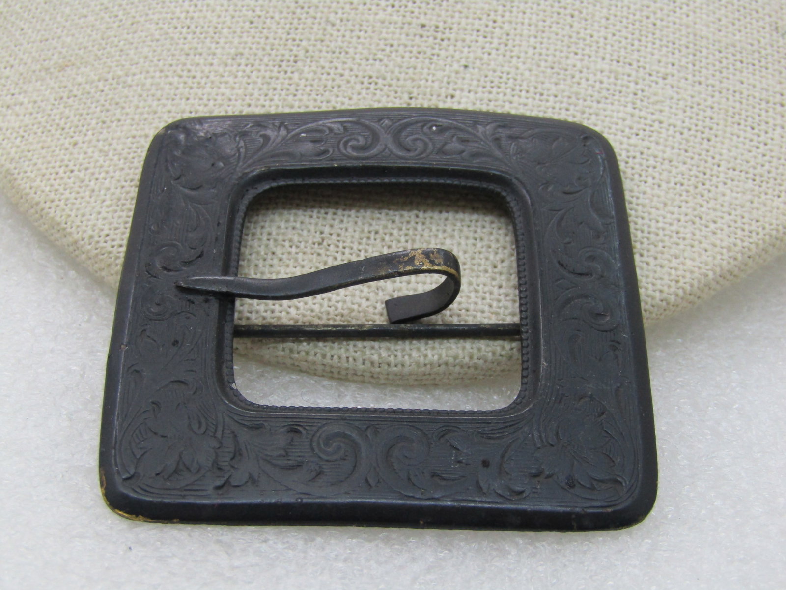 Vintage Black Enameled Square Buckle Brooch Early 1900's, C-Clasp: Vintage Black Enameled Square Buckle Brooch, Early 1900's, C-Clasp, 2.25" . Stamped scrolled design like you'd often see in southwestern pieces. Not signed by the maker. Very good condition. (INV. w.1
