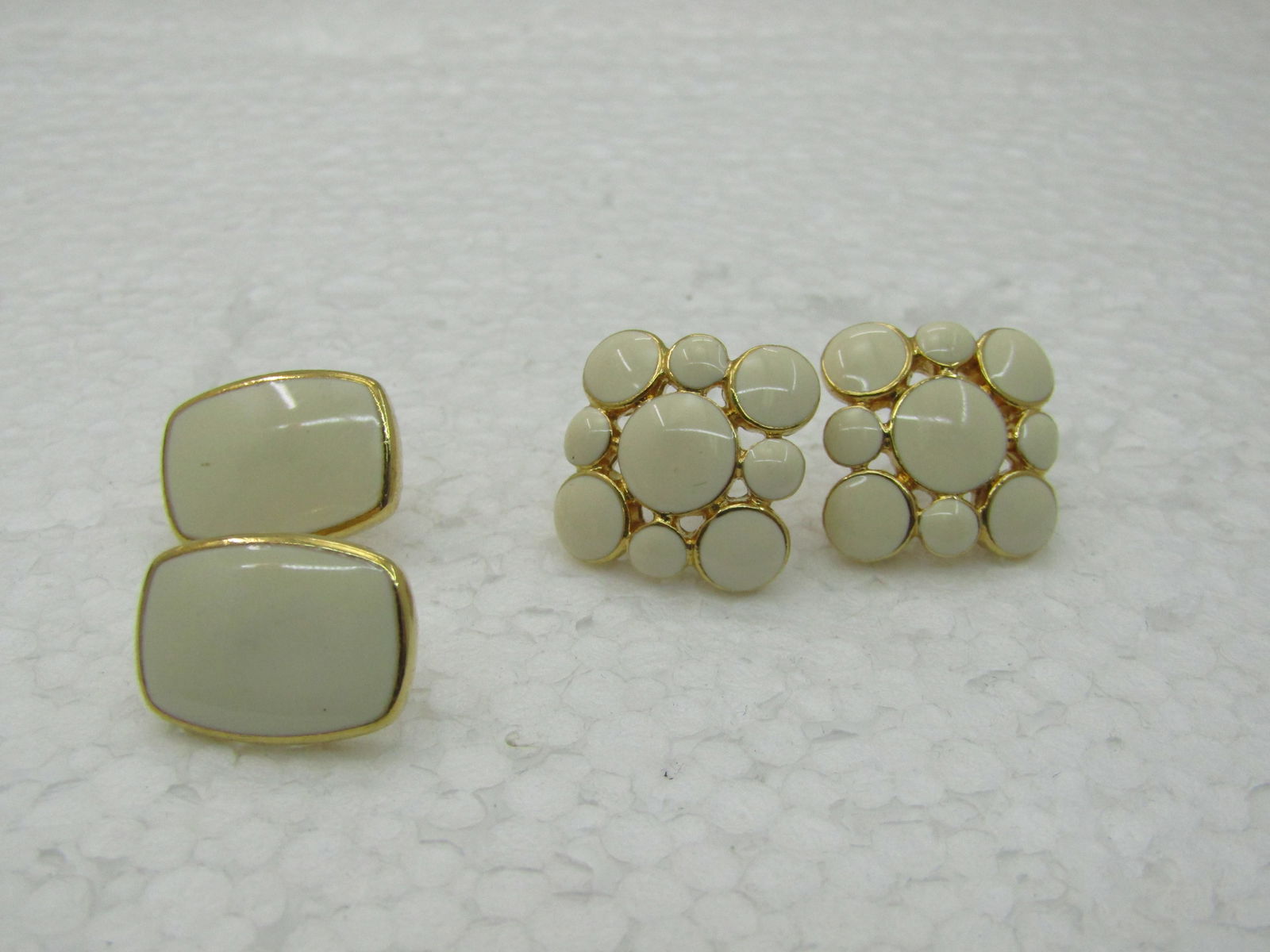 Vintage Napier Faux Pearl Brooch, Piereced Earrings with Extra Earrings, Gold Tone: Vintage Napier Faux Pearl Brooch, Piereced Earrings with Extra Earrings, Gold Tone. The brooch is a pointed 2.75" curved faux bezel-set faux pearl brooch Signed Napier. Napier enameled tan pierced