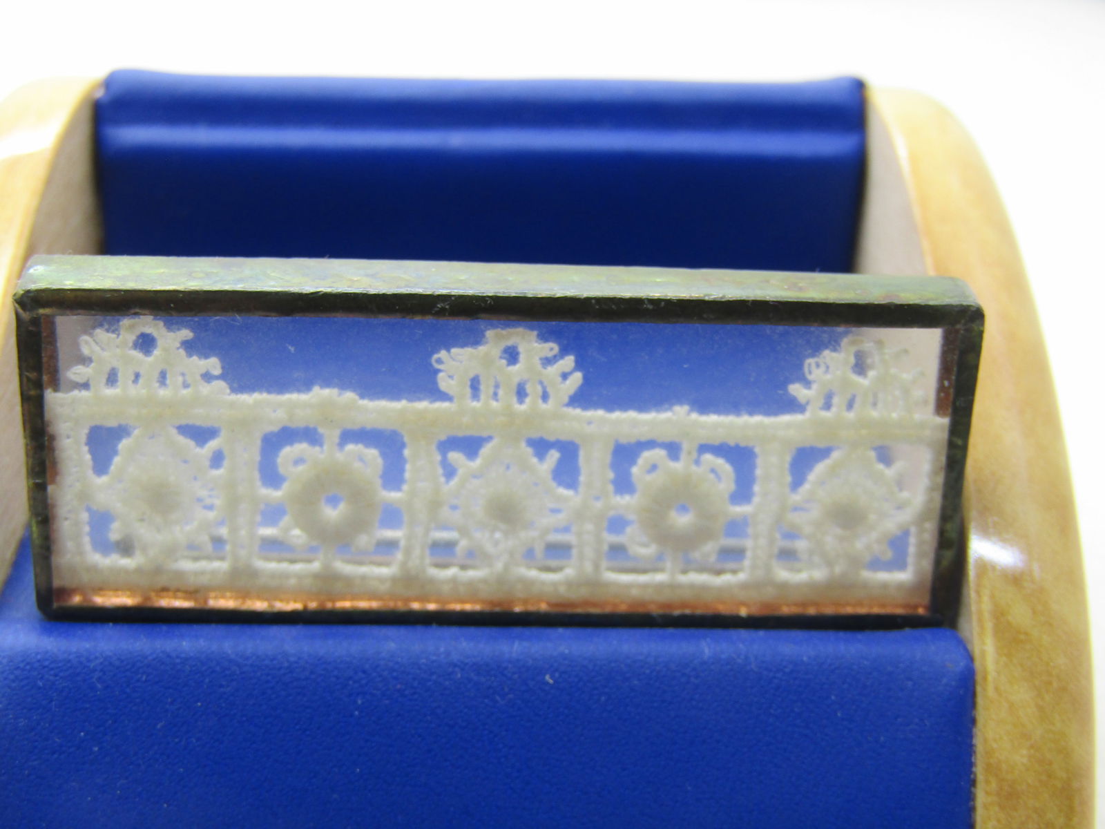 Vintage Framed Lace Brooch, 2" Rectangle, Silver Tone: Vintage Framed Lace Brooch, 2" wide, 3/4" tall, Rectangle, Silver Tone. Appx. Mid-Century to 1980's. White lace framed inside a glass silver tone casing. It does not test as sterling. Not signed by ma