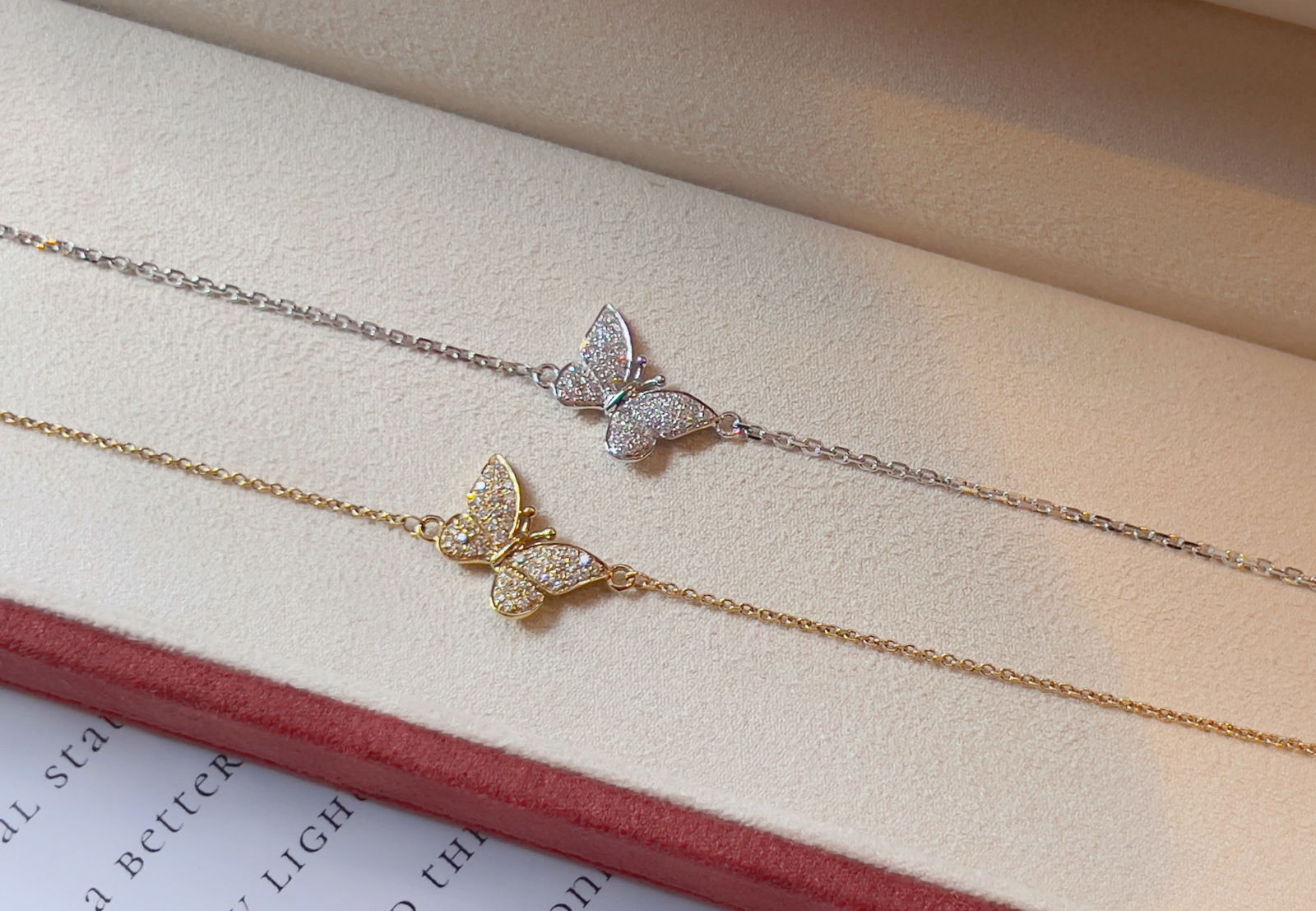 18K Gold Diamond Butterfly Bracelet: Title: 18K Gold Diamond Butterfly Bracelet Description: Elegant 18K gold bracelet featuring a butterfly motif fully encrusted with brilliant-cut diamonds. The design showcases intricate craftsmanship