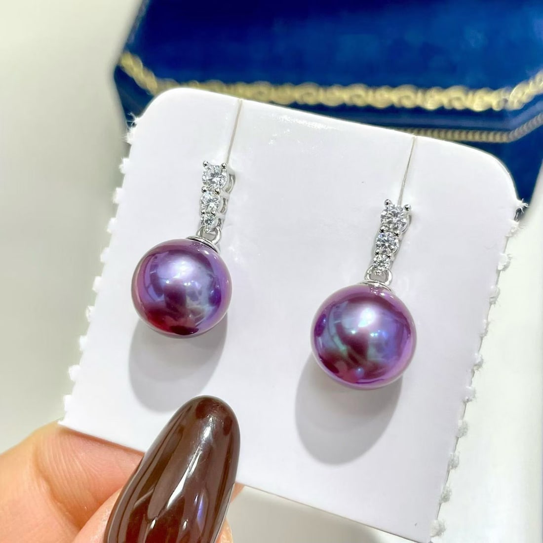 9-10mm Natural Deep Purple Edison Pearl Stud Earrings, S925 Silver: Title: 9-10mm Natural Deep Purple Edison Pearl Stud Earrings, S925 Silver Description: Pair of stud earrings featuring 9-10mm natural deep purple Edison pearls. The pearls are near-round, nearly flawl