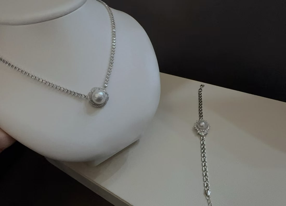 11-12mm Edison Pearl Necklace and Bracelet Set, Sterling Silver: Title: 11-12mm Edison Pearl Necklace and Bracelet Set, Sterling Silver Description: Elegant jewelry set featuring a necklace and bracelet adorned with 11-12mm near-round Edison pearls. Pearls are near