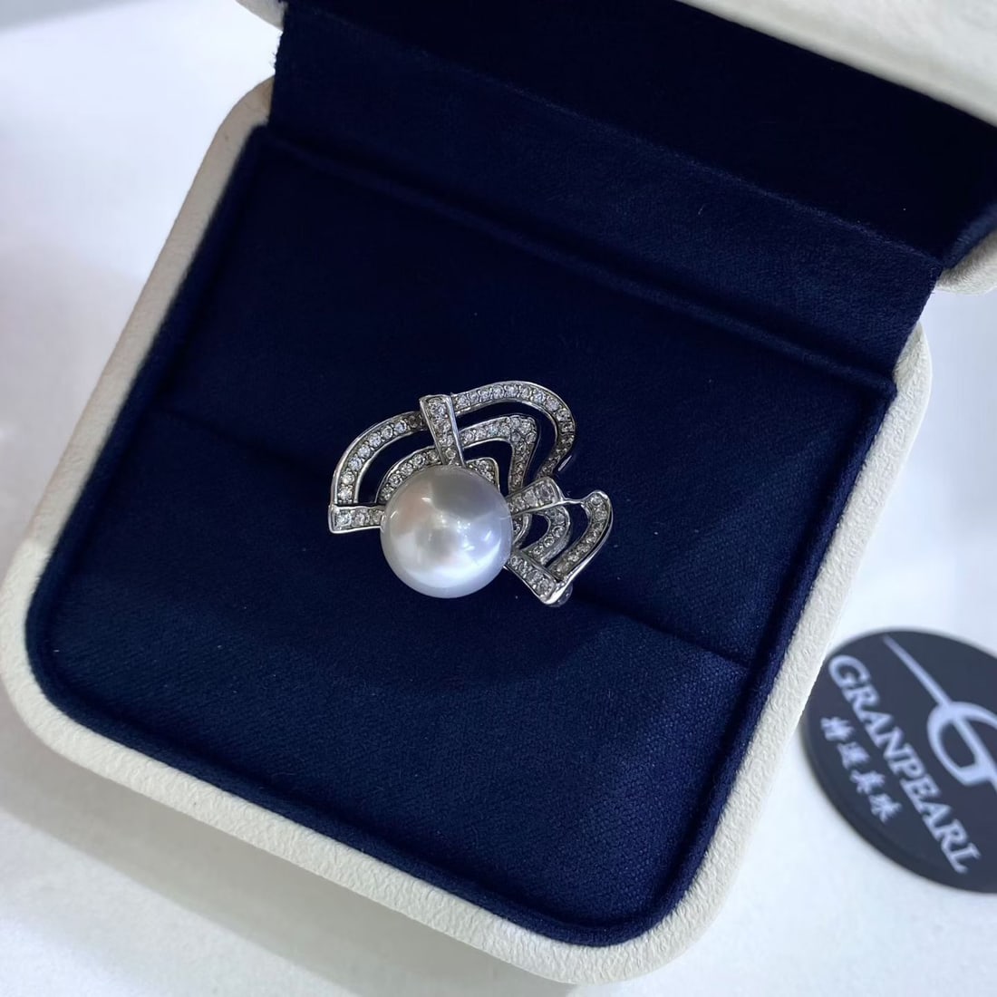 Sterling Silver Ring with 10-11mm Natural South Sea Pearl: Title: Sterling Silver Ring with 10-11mm Natural South Sea Pearl Description: Elegant ring featuring a 10-11mm near-round natural South Sea pearl, set in solid S925 sterling silver. The pearl is high-