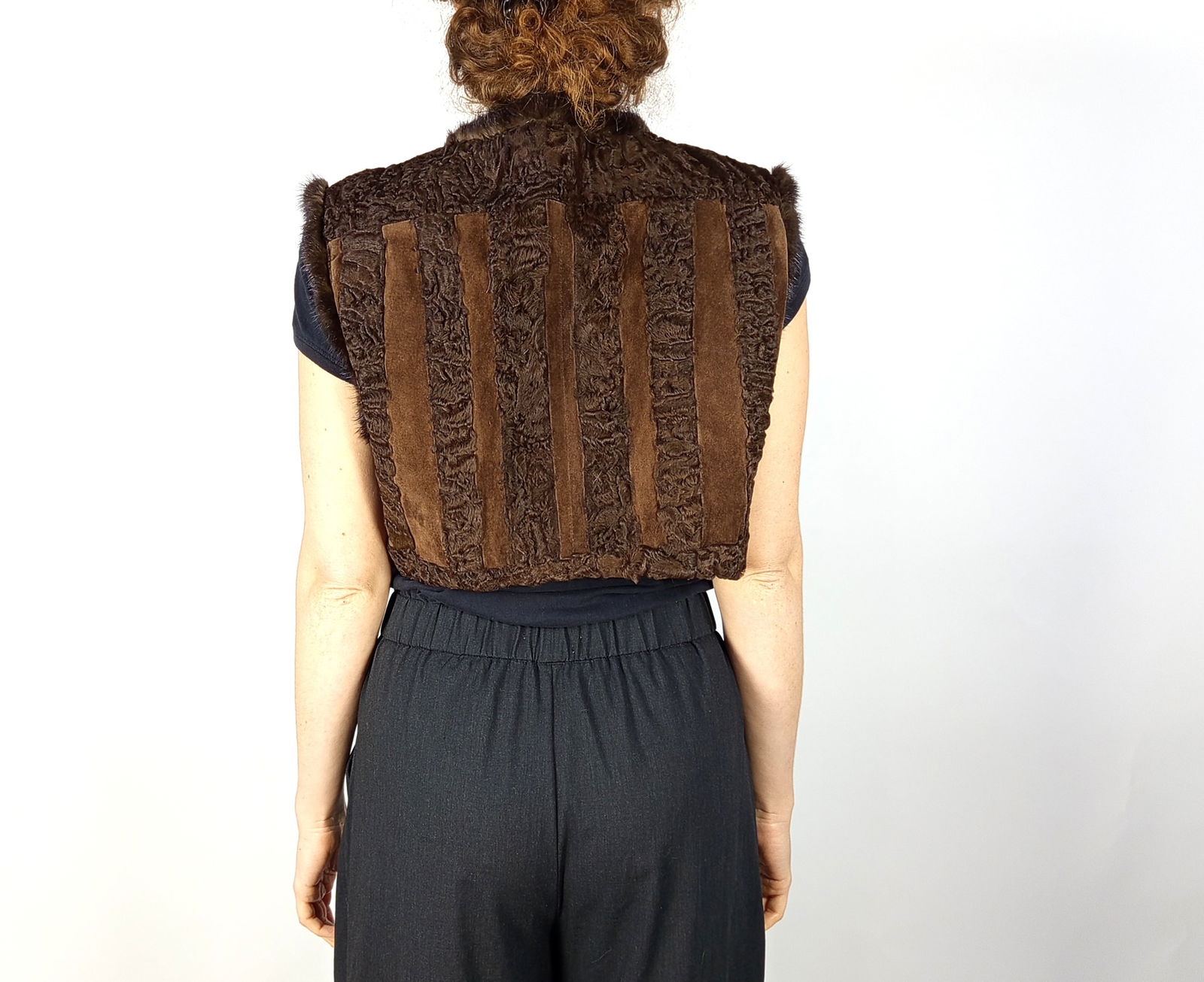 BROWN KARABUL FUR VEST EU: L - US:16: Title: BROWN KARABUL FUR VEST EU: L - US:16 Dimensions: Approximate size- EU: L; US: 16 : Important details: Length: 48cm/18.9in -Shoulders width:44cm/17.32in -Sleeve Length:0cm/0in -Bust size ( pit