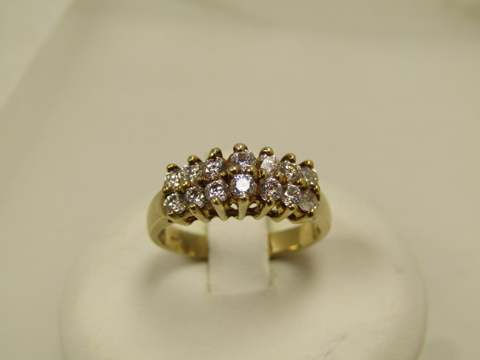 Vintage 10kt CZ Two Row Ring, Sz. 5, 1980's, Signed: Title:Vintage 10kt CZ Two Row Ring, Sz. 5, 1980's, Signed Description:Vintage 10kt CZ Two Row Ring, Sz. 5, 1980's, Signed with SE and marked 10kt and tests as 10kt with an appx. weight of 3.16 grams.