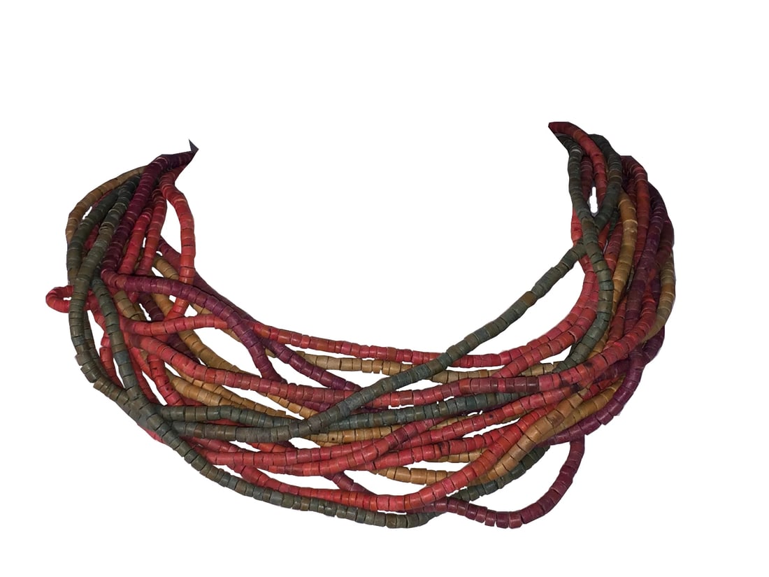 Multi Stand Dyed Wood Bead Necklace: Title:Multi Stand Dyed Wood Bead NecklaceDescription:Multi Stand Dyed Wood Bead Necklace, mother of pearl shell unique end caps. Made in India. Necklace is 20" long and 2" wide. Closes with hook and