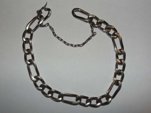 Men's Sterling Silver Figaro Link Bracelet 1: Title:Men's Sterling Silver Figaro Link Bracelet 1 Description:Great and hand made construction. Hand made closure with safety chain. Measures 9 1/2" and 9 mm's wide, so it's very comfortable and lays