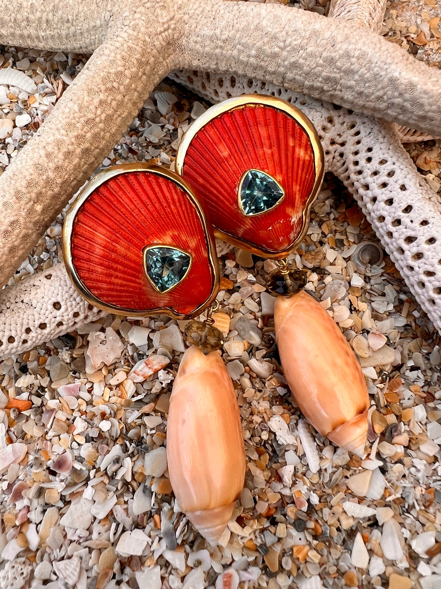 Pink Olive Shell Drop Earrings with Swiss Blue Topaz: Title:Pink Olive Shell Drop Earrings with Swiss Blue Topaz Description:Pair of drop earrings with gorgeous Red Scallops as tops, set with 5-carat Swiss Blue Topaz. The drops are special Pink Olive She