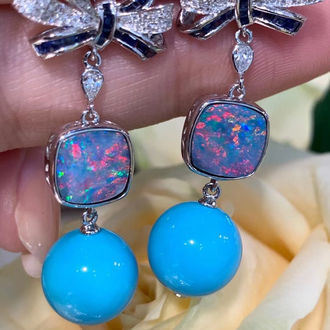 14K GOLD 3.72 CTW NATURAL OPAL & DIAMOND EARRINGS: Title:14K GOLD 3.72 CTW NATURAL OPAL & DIAMOND EARRINGSDescription:Ref:230528288Gold Content:14K GoldMain Gemstone:OpalNumber of stones:2Shape:CushionCarat Weight:3.5ct