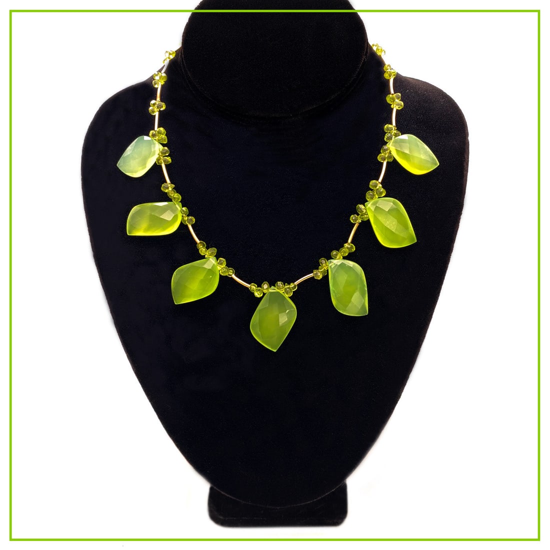 Gold Filled Necklace with Chalcedony and Peridot Gemstones: This is our original necklace. We created it with seven lime green twist cut chalcedony leaves (up to 20 mm x 30 mm) and faceted peridot strung with 14K GF tubes and other components. Dimensions: 16.2
