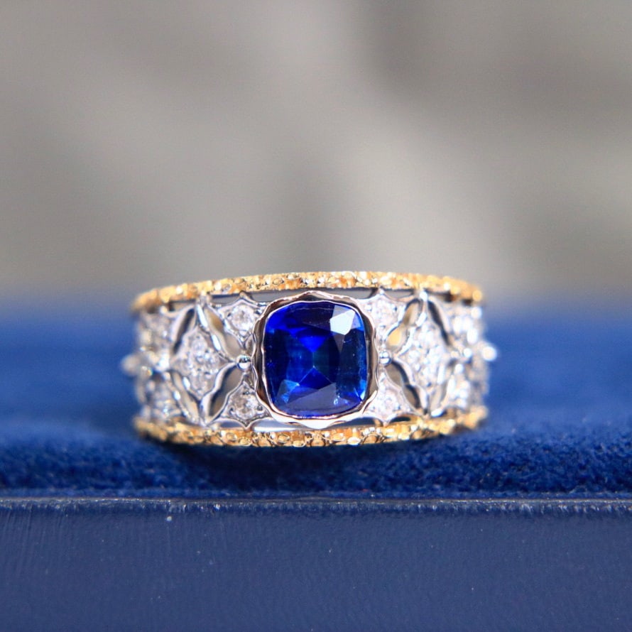 14K GOLD 1.48 CTW NATURAL SAPPHIRE & DIAMOND RING: Title:14K GOLD 1.48 CTW NATURAL SAPPHIRE & DIAMOND RINGDescription:Ref:230528254Gold Content:14K GoldRing Size:7.25USMain Gemstone:SapphireNumber of stones:1Shape:CushionCarat Weight:1.25ct