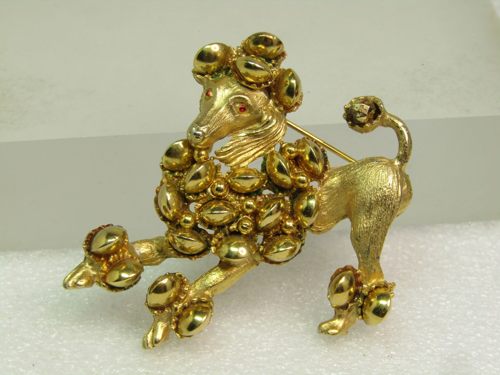 Vintage Gold Tone Poodle Brooch, Signed HAR 1950's,: Title:Vintage Gold Tone Poodle Brooch, Signed HAR 1950's, Description:Vintage Gold Tone Poodle Brooch, Signed HAR 1950's, This has textured finish on the legs, back end and face and ears. The part of