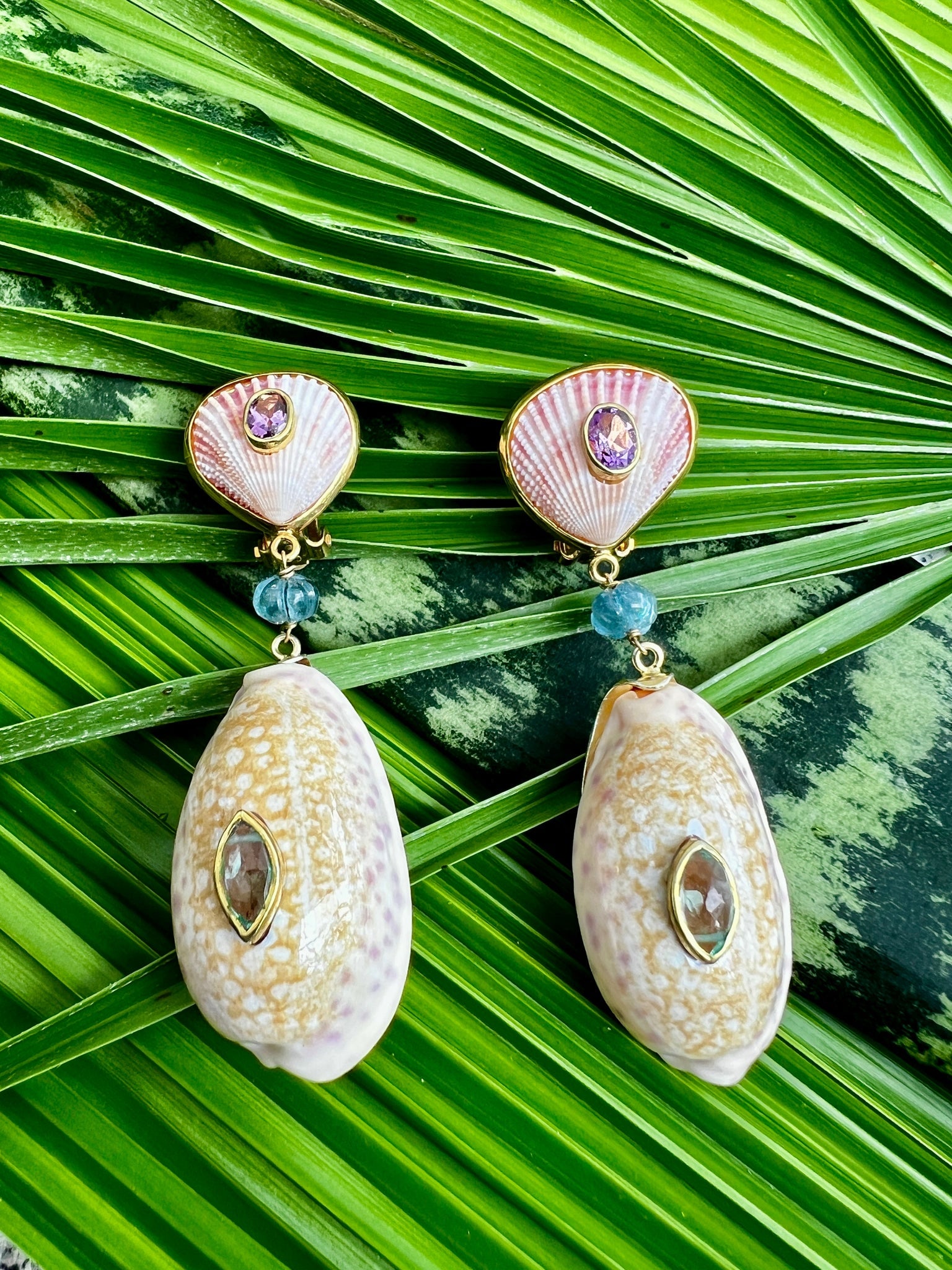 Cyprea Shell Drop Earrings with Kyanite & Tourmalines: Title:Cyprea Shell Drop Earrings with Kyanite & Tourmalines Description:Pair of light but showy drop seashell earrings with Scallops set with lavender Tourmalines. Darling, carved Kyanite, specimen Cy
