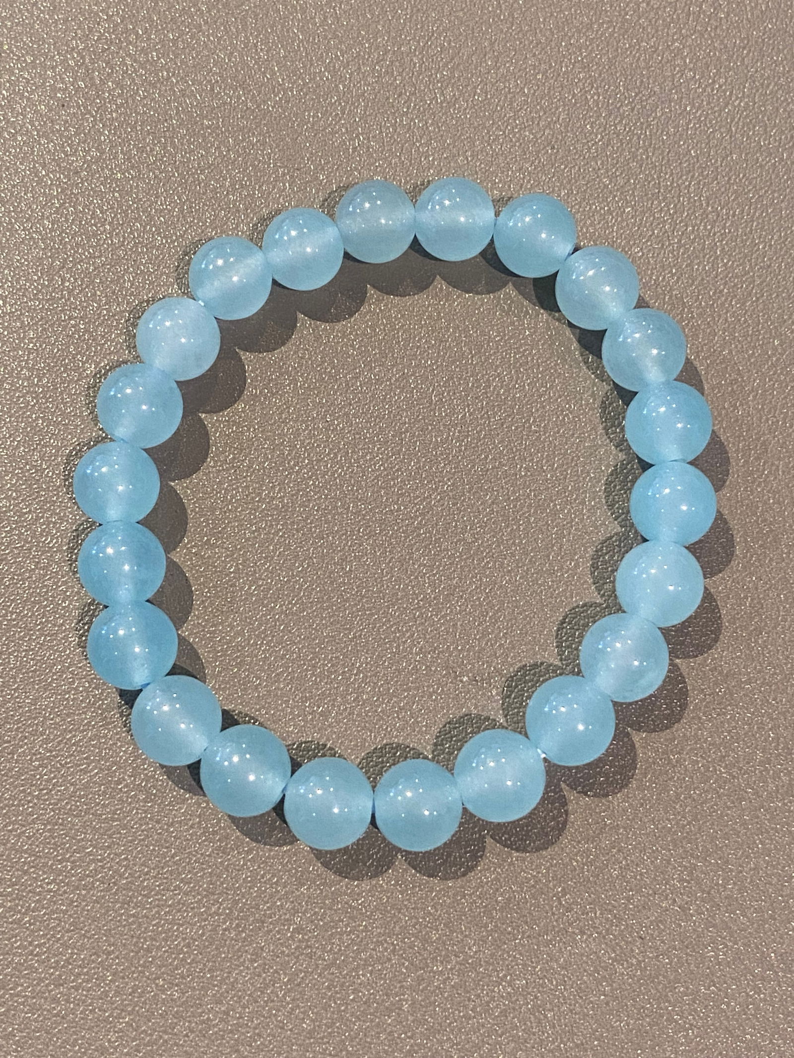 Natural Gemstone Aquamarine 8mm round beads bracelet: Title:Natural Gemstone Aquamarine 8mm round beads braceletDescription:Natural Gemstone Aquamarine 8mm round beads bracelet Aquamarine is the birthstone for March. Aquamarine is great for those who