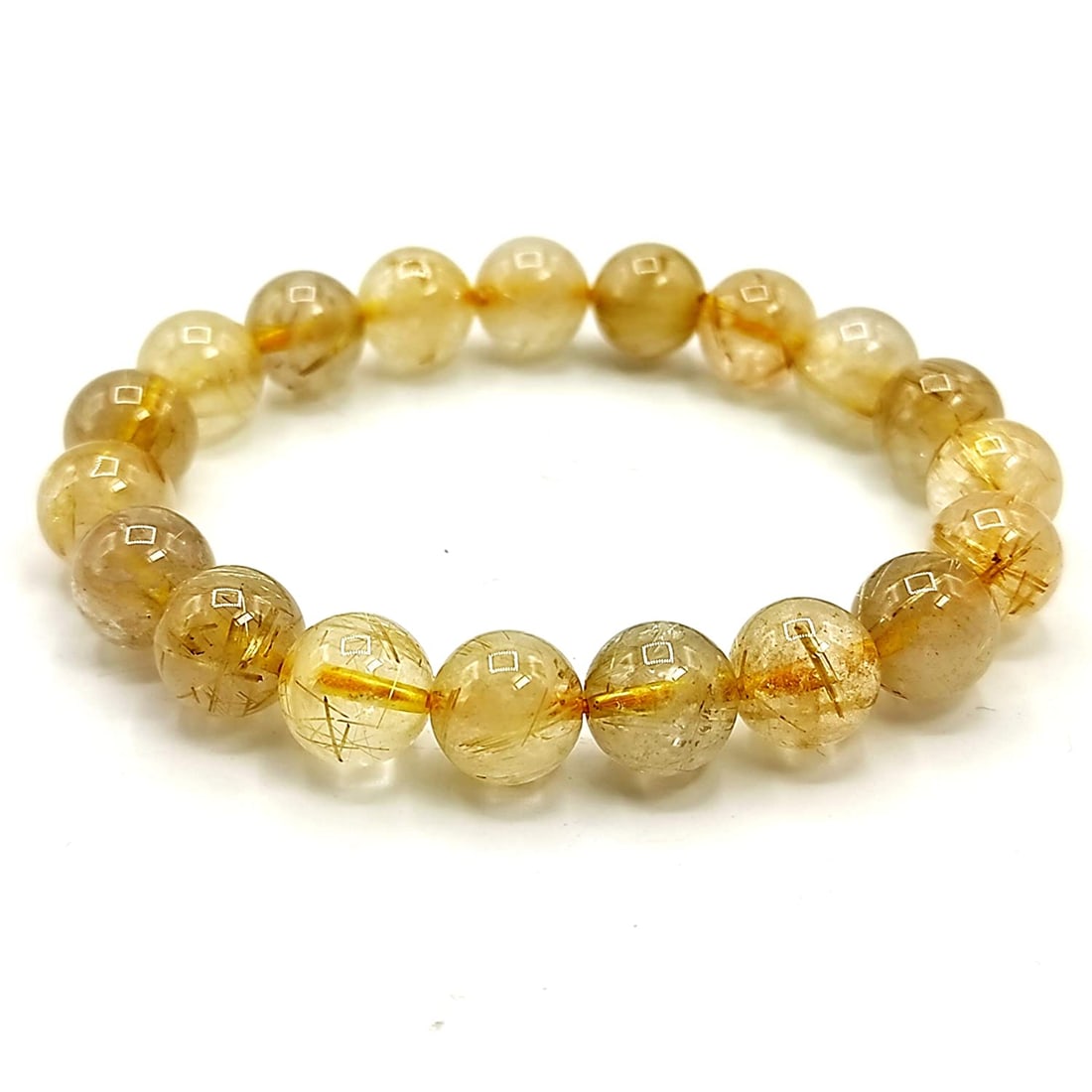100% natural gold rutilated quartz crystal 10mm beads bracelet: Title:100% natural gold rutilated quartz crystal 10mm beads bracelet Description:100% natural gold rutilated quartz crystal 10mm beads bracelet It is fun to gaze into Rutilated Quartz – clear qu