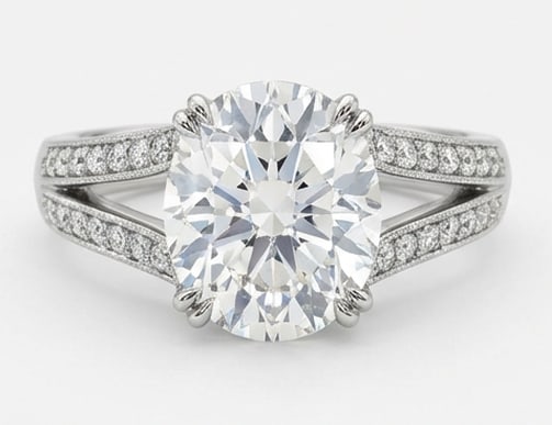 Wide Split Shank with Pave Oval Cut 6 ct Lab-Grown Diamond Ring in 14K White Gold: Title: Wide Split Shank with Pave Oval Cut 6 ct Lab-Grown Diamond Ring in 14K White Gold Description: This refined wide split shank with pave ring features a 6 ct lab-grown diamond in a oval cut cut,