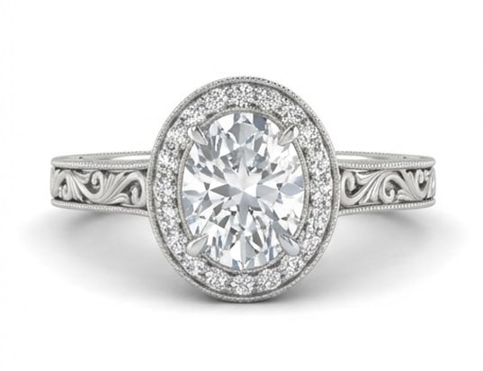 Halo with Scroll/Filigree Shank Oval Cut 4 ct Lab-Grown Diamond Ring in 14K White Gold: Title: Halo with Scroll/Filigree Shank Oval Cut 4 ct Lab-Grown Diamond Ring in 14K White Gold Description: This refined halo with scroll/filigree shank ring features a 4 ct lab-grown diamond in a oval