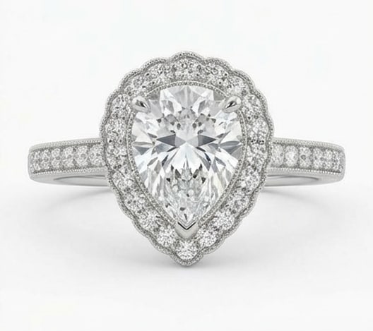Classic Halo with Pave Band & Milgrain Pear Shape 5 ct Lab-Grown Diamond Ring in 14K White Gold: Title: Classic Halo with Pave Band & Milgrain Pear Shape 5 ct Lab-Grown Diamond Ring in 14K White Gold Description: This refined classic halo with pave band & milgrain ring features a 5 ct lab-grown d