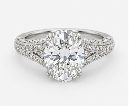 Intricate Vintage Split Shank with Pave Oval Cut 3 ct Lab-Grown Diamond Ring in 14K White Gold: Title: Intricate Vintage Split Shank with Pave Oval Cut 3 ct Lab-Grown Diamond Ring in 14K White Gold Description: This refined intricate vintage split shank with pave ring features a 3 ct lab-grown d