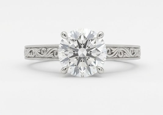 Vintage Solitaire with Filigree/Scroll Shank Round Brilliant 3 ct Lab-Grown Diamond Ring in 14K: Title: Vintage Solitaire with Filigree/Scroll Shank Round Brilliant 3 ct Lab-Grown Diamond Ring in 14K White Gold Description: This refined vintage solitaire with filigree/scroll shank ring features a