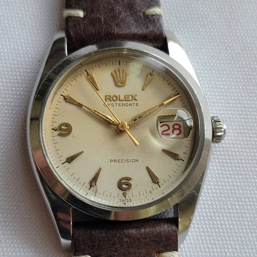 Rolex Oysterdate Precision 6494 34mm Mens 1950s Hand Wind Roulette Date RA191C: Title:Rolex Oysterdate Precision 6494 34mm Mens 1950s Hand Wind Roulette Date RA191C Description:Timeless classic, Men's Rolex Oysterdate Precision Ref.6494 hand-wind dress watch with roulette red-bla