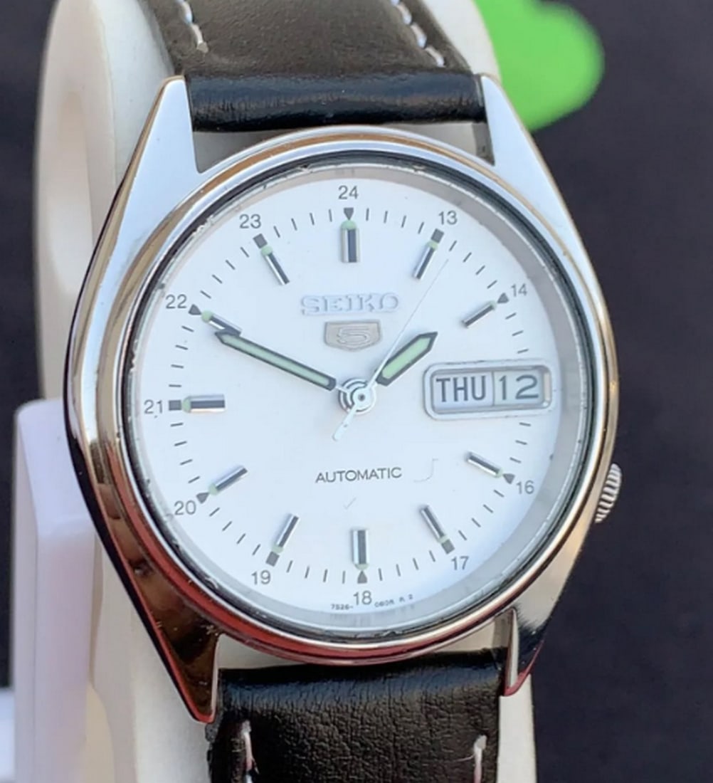 Vintage Seiko Automatic 7S26-6000 With Day / Date: Ships from a small business in Pakistan Band material: Stainless steel Materials: Stainless steel Power: Mechanical Readout: Analog Can be personalized Reserve: $500.00 Shipping: Domestic: Flat-rate o