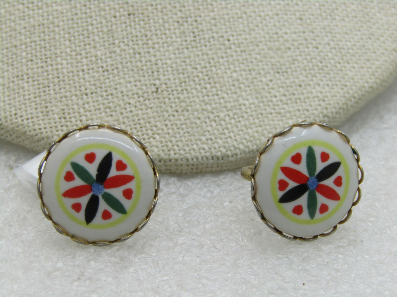 Vintage Hex Sign Earrings, Screw Back, 1960's-1970's, Round: Vintage Hex Sign Earrings, Screw Back, 1960's-1970's, Round - Gold tone. 3/4" round with a scalloped bezel holding the hex sign. PA Dutch style. Light wear - good condition. (INV.W.1.1219.3) Reserve: