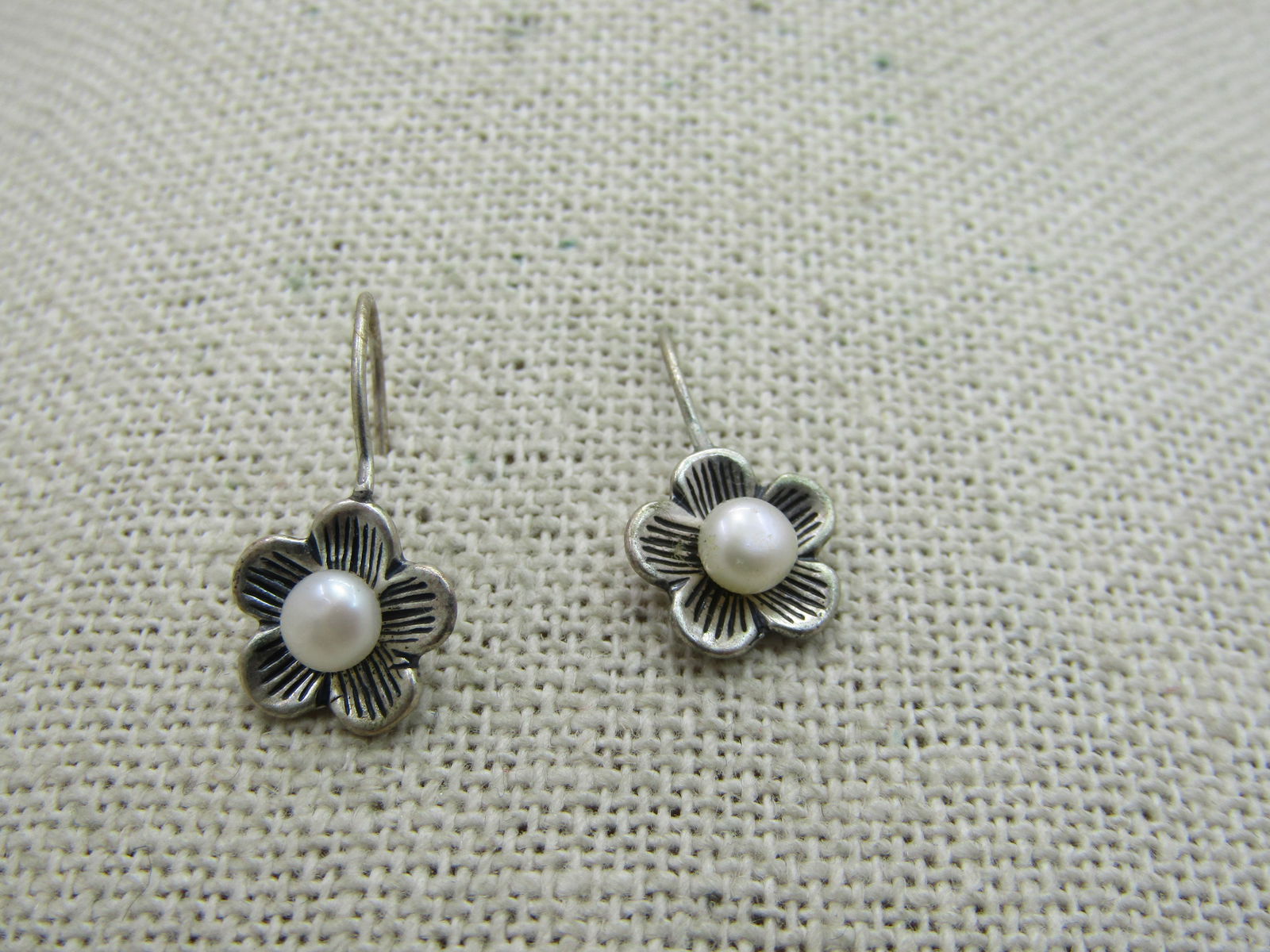 Vintage Sterling Blossom Drop Earrings, 4mm Cultured Pearl: Vintage Sterling Blossom Drop Earrings, 4mm Cultured Pearl, 3/4" long from curve in hook post and the blossoms are appx. 1/2" across and weight is 1.75 gr. Five petals with ridged accents. Signed S an