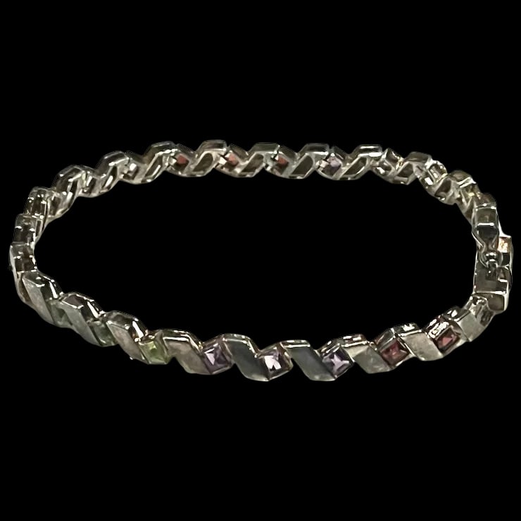 Vintage Sterling Silver Colorful Origami Bracelet: Title: Vintage Sterling Silver Colorful Origami Bracelet Description: Vintage Sterling Silver Colorful Origami BraceletHallmarked: 925Weighs 15.5 grams Measures Approx. 7.75 inches Reserve: $55.00 