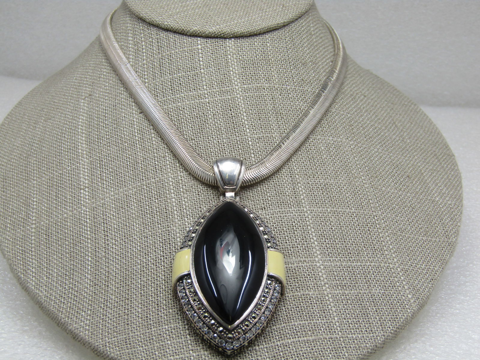 Sterling Faux Marcasite & Onyx Rhinestone Pointed Necklace, Enameled Accents, 18": Sterling Faux Marcasite & Onyx Rhinestone Pointed Necklace, Enameled Accents, 18" This has a faux onyx center stone, set on a point, bezel-set. The center stone is appx. 1-7/8" long and1" wide. It has
