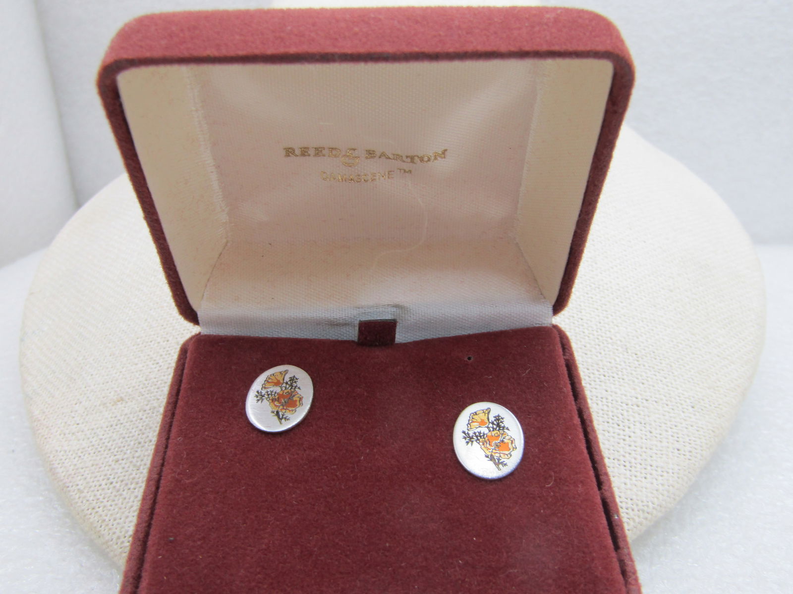 Vintage Reed & Barton Oval Floral Pierced Earrings, New Vintage in Box: Vintage Reed & Barton Floral Stem Earrings, Pierced Oval, New Vintage in Box. These are appx. 5/8" by 1/2" ovals with a gold background and silver and copper tones. The insert card lists it as pure si