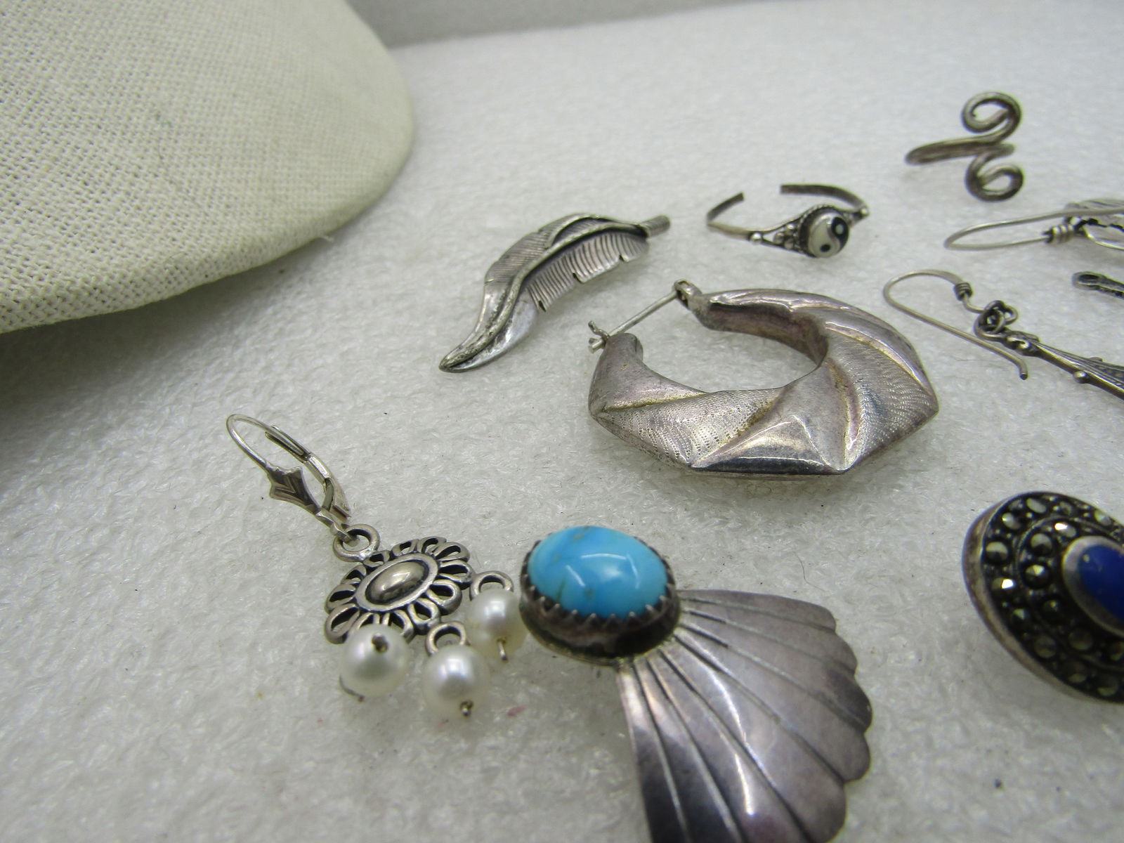 12 Sterling Pieces, Single Earrings, Dangles, more. 25.49 grams - 3