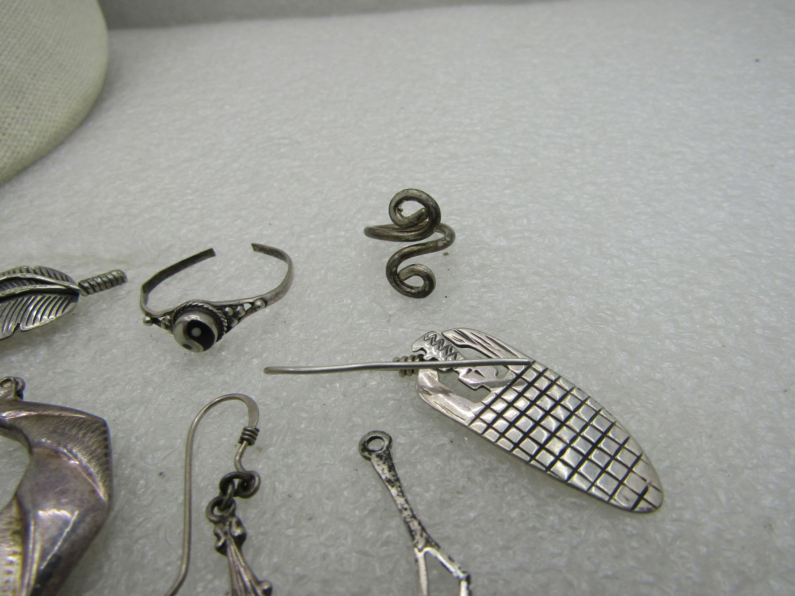 12 Sterling Pieces, Single Earrings, Dangles, more. 25.49 grams - 5