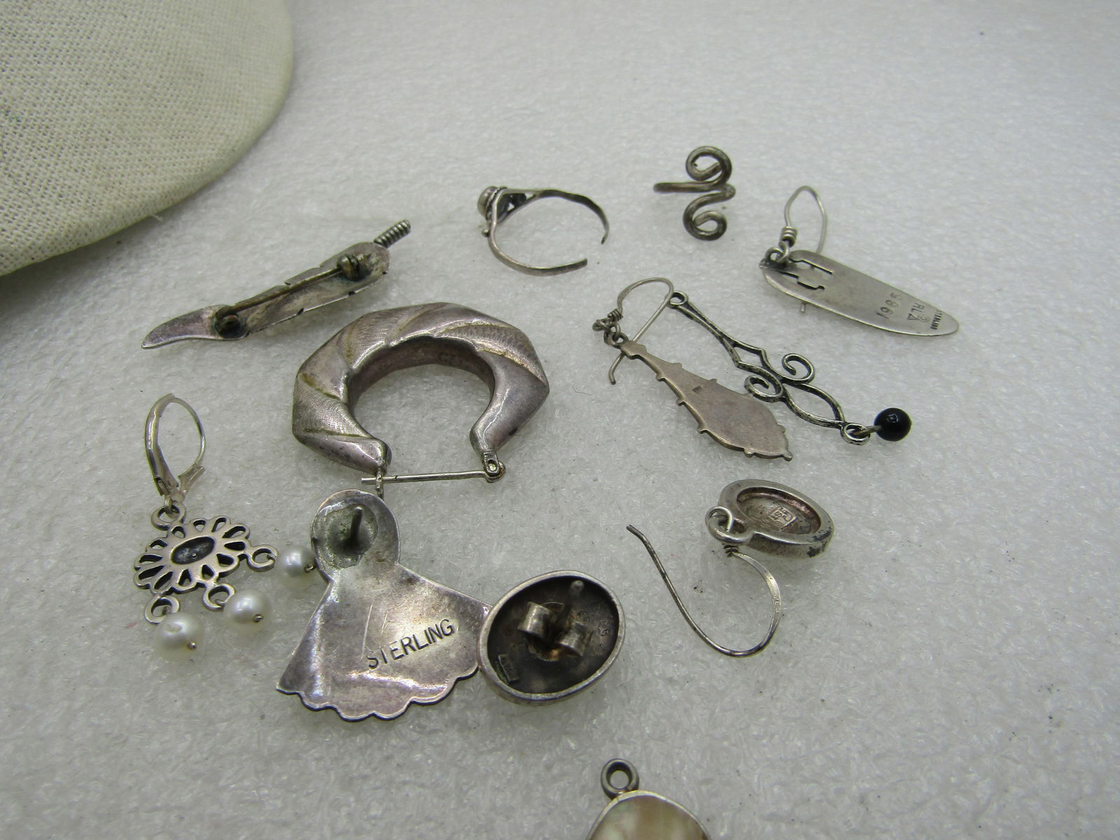 12 Sterling Pieces, Single Earrings, Dangles, more. 25.49 grams - 6
