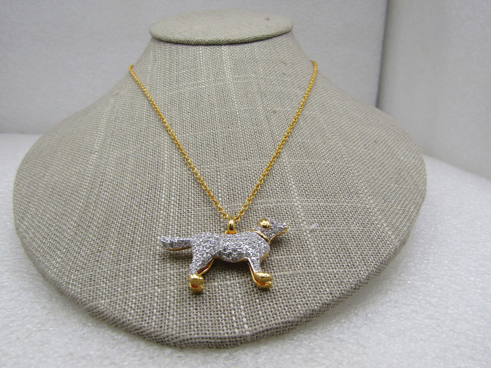 Danbury Mint Rhinestone Retreiver Necklace, 20", Original Box: Danbury Mint Rhinestone Retreiver Necklace, 20", Original Box. Two tone, gold tone on the body where the rhienstoens are not set - one side of the dog is silver tone and pave set with rhinestones on t